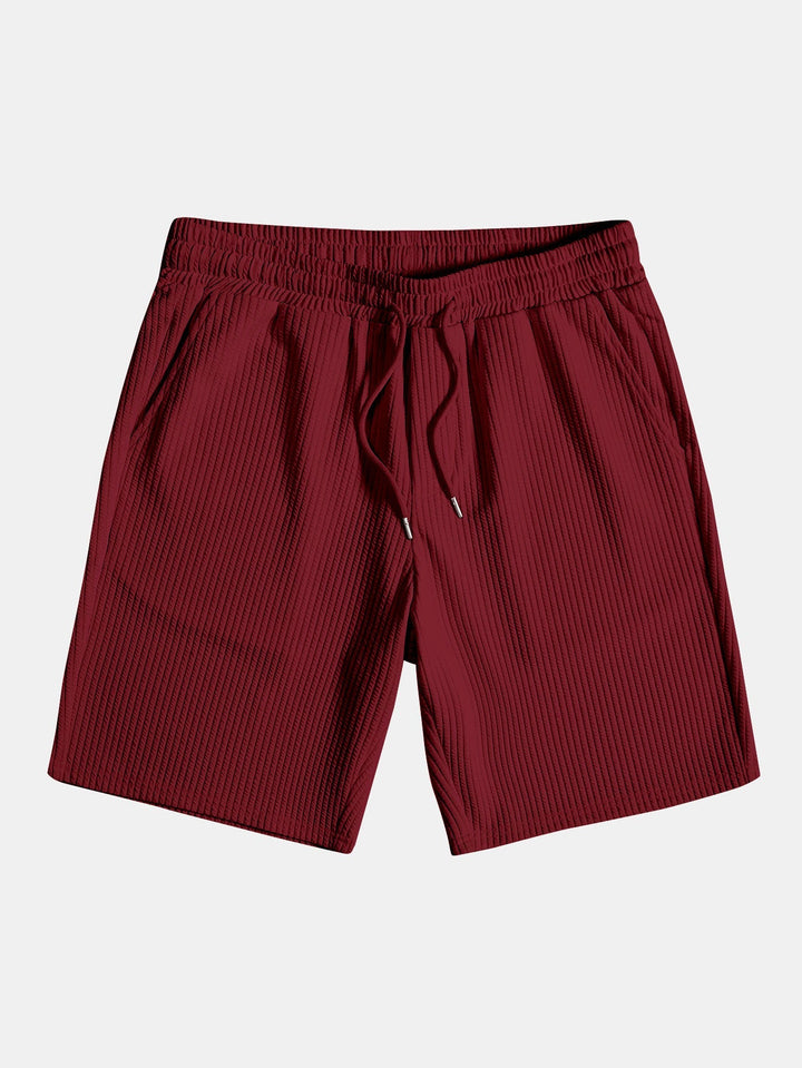 Camicia e pantaloni corti con colletto a coste muscolari