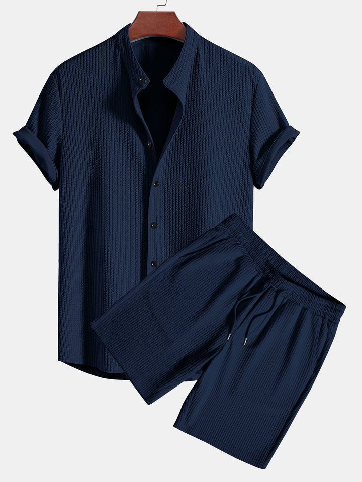 Camicia e pantaloni corti con colletto a coste muscolari