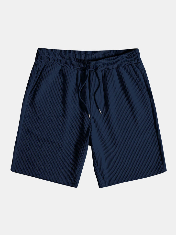 Camicia e pantaloni corti con colletto a coste muscolari