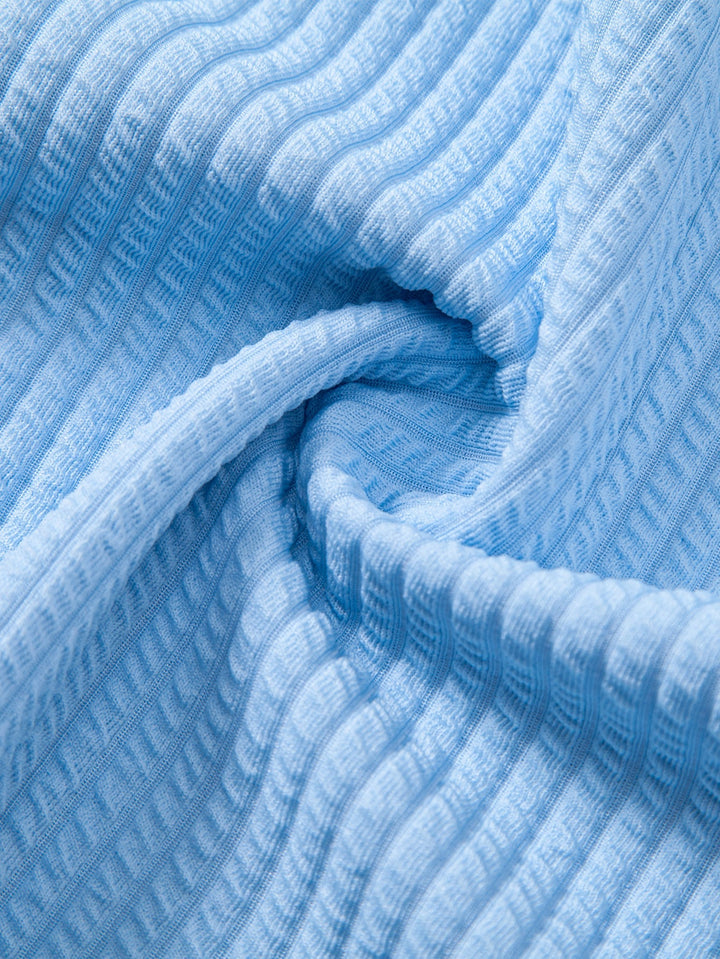 Camicia a maniche lunghe a coste, taglio muscolare, con bottoni