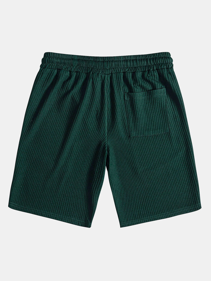 Camicia e pantaloni corti con colletto a coste muscolari