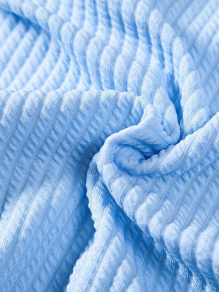 Camicia e pantaloni corti con colletto a coste muscolari